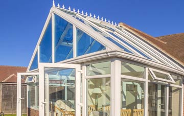 conservatory roof insulation costs Lambs Green